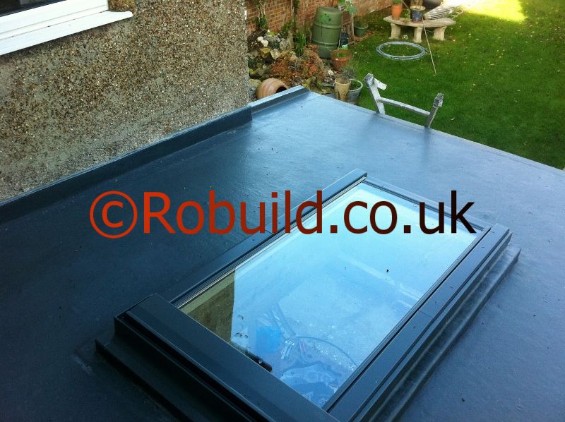 fibreglass flat roof and velux window over extension